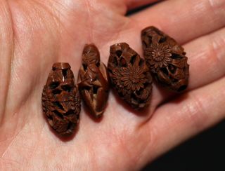 Antique Chinese Carved Heidao Nut Beads Of Flowers,  Qing Dynasty,  19th Century.