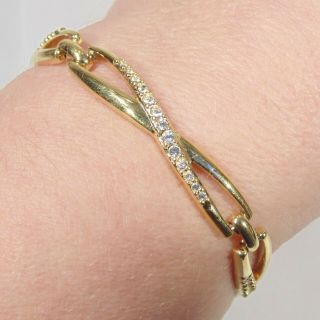 Vintage Swan Signed Swarovski Crystal Rhinestone Infinity Gold Tone Bracelet