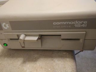 Commodore 1541 floppy disc drive,  w/power supply and data cord 2