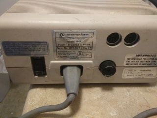 Commodore 1541 floppy disc drive,  w/power supply and data cord 3