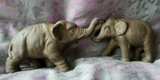 Set Of 2 Antique Vintage Solid Cast Iron Elephants/figurines.  Stamped With An H.