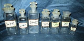 7 Antique Glass Label Apothecary Bottles