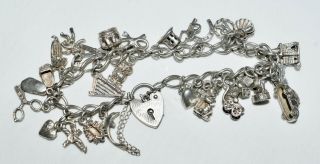 Fabulous Vintage Sterling Silver Heart Clasp Charm Bracelet 30 Charms Wt 38gr