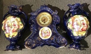 Antique Angelica Kauffman Mantle Clock And Two Matching Vases