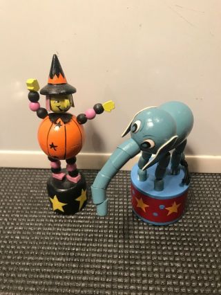 2 Vintage Wooden Push Up Toys Elephant And Witch On Pumpkin Push Up Puppets