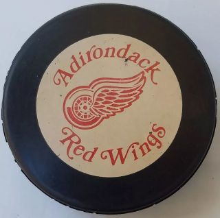 Vintage Adirondack Red Wings Ahl Inglasco Hockey Puck Canada ? Czechoslovakia ?