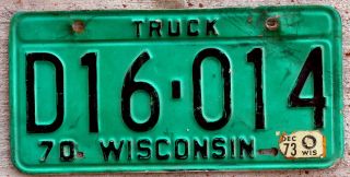 1970 Black On Turquoise Wisconsin Truck License Plate With A 1973 Sticker