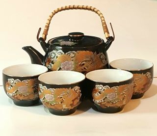 Vintage Japan Sake Tea Pot With 4 Cups Black Hand Painted Dragons And Flowers.