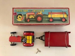 Vintage Schylling TIN TRACTOR & TRAILER and Key 3