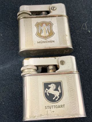 2 Vintage Eveready Semi Automatic Pocket Lighters - Munchen & Stuttgart