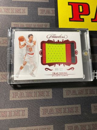 2018 - 19 Flawless Trae Young Game Worn Rookie Patch Ruby 06/12