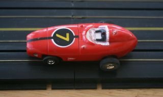 Vtg Aurora Tjet Indy Racer Ho Slot Car,  Red 7,  No Head,  Runs,  Solid Rivet