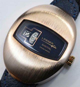 1970s Swiss Made Lasser Jump Hour Direct Read Watch Gold Oval Egg Case Blue Dial