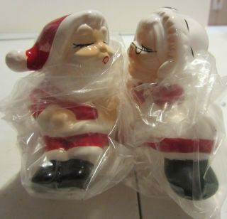 Vintage Santa And Mrs Claus Kissing On Bench Salt And Pepper Shakers