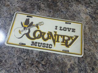 Vintage Metal Embossed I Love Country Music Novelty License Plate