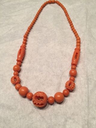 Vtg ‘60’s Carved Celluloid Faux Coral Bead Necklace 17” Around (8 1/2”drop)