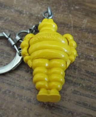 Vintage Plastic Keychain Puzzles Michelin Man Tires From France Yellow One