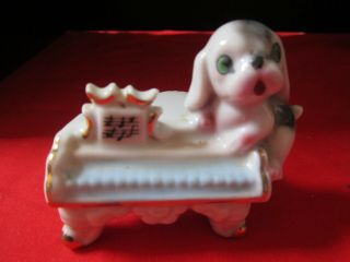 Vintage Dog On Piano Figurine.  Ceramic.  Japan.  Miniature 3 ".  B&w Puppy.