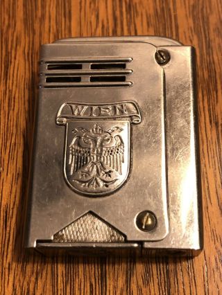 Vintage 1930’s Wien Imco Lighter Silby Side Squeeze Embossed Shield Raee