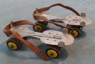 Vintage Collectible - Steel Strap - On Roller Skates - Patina & Collectible