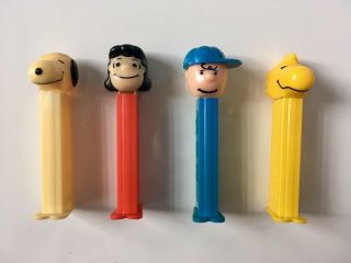 Vintage 1960s Peanuts Charlie Brown,  Snoopy,  Lucy,  Woodstock Pez Dispensers