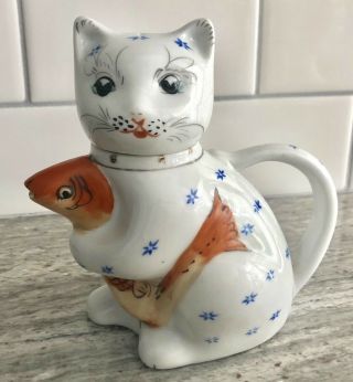 Vintage Small Tea Pot Of A Cat Holding A Fish,  5” Tall
