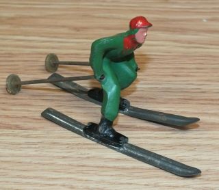 Vintage Barclay Winter Themed Man In Green Suit Skiing Collectible Metal Figure