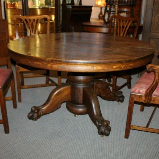 Antique Round Oak Dining Table – Carved Claw Feet – 5 Leaves – 54 Inches