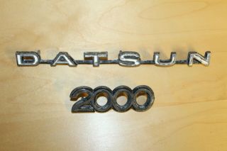 Vintage Oem Datsun 2000 Roadster Metal Emblems