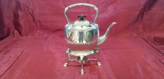 An Antique Victorian Silver Plated Spirit Kettle And Stand By Atkin Brothers.