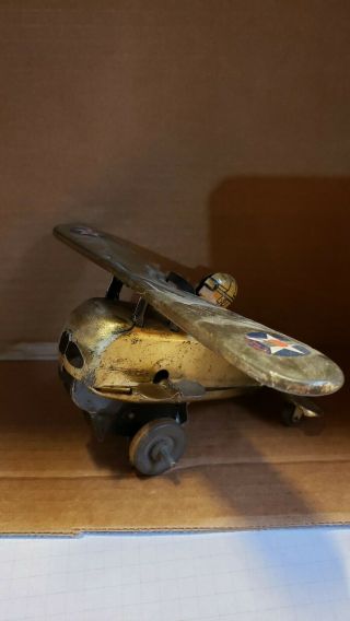 Vintage Tin Toy Wind Up Training Plane Wooden Wheels Occupied Japan??