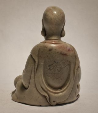 Antique carved steatite figure of a seated Luohan with incised robes 3