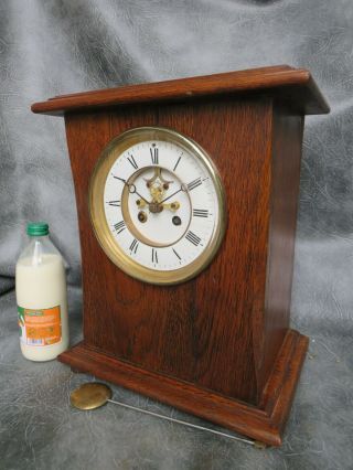 A Good Large Oak Cased Bell Strike French Clock With Visible Escapement Serviced