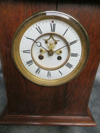 A GOOD LARGE OAK CASED BELL STRIKE FRENCH CLOCK WITH VISIBLE ESCAPEMENT SERVICED 3