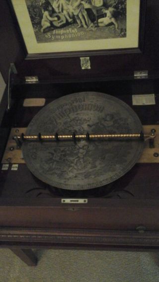 antique Imperial Symphonion music box with 20 discs,  and stand 2