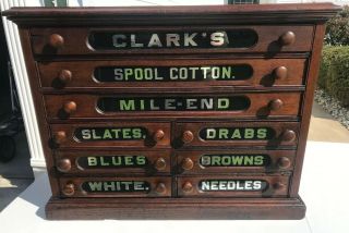 Antique Country Store Clark’s Nine Drawer Walnut Spool Cabinet Black Glass
