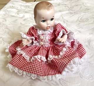 Vintage 7 1/2” All Bisque Baby Doll Jointed Gingham Dress & Bloomers