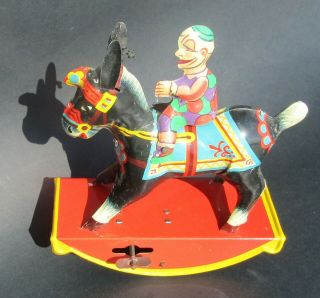 Vintage Gama Germany Tin Wind Up Clown Riding A Rocking Donkey