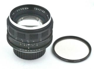 Vintage Minolta Auto Rokkor - Pf 58mm 1:1.  4 Lens With Minolta 1a Filter