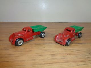 Two Arcade Vintage Cast Iron Red And Green Dump Trucks