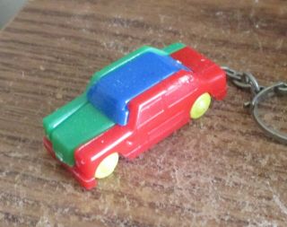 Vintage Plastic Keychain Puzzle Automobile Made In Europe