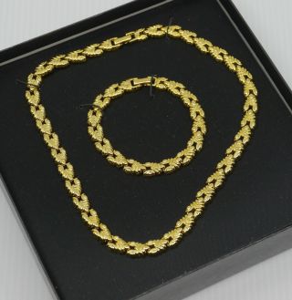 Vintage Monet Signed Gold Toned Metal Necklace & Bracelet Set,  V - Shape Links