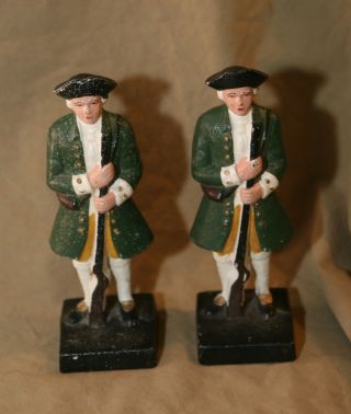 2 Vintage Painted Cast Iron Figural Door Stops Colonial Soldiers At Rest Good