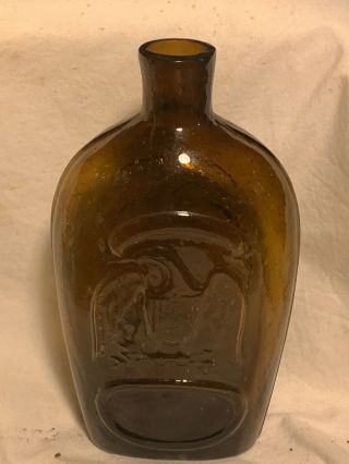 Antique Pre - Pro 1/2 - Pint Embossed Eagle Whiskey Flask Amber