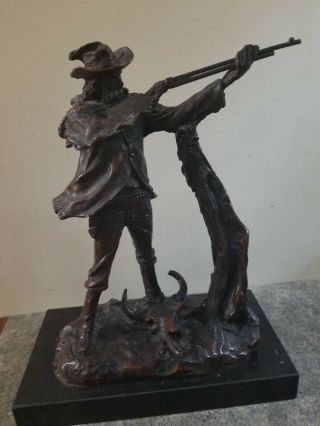 Bronze Sculpture Vintage C.  M.  Russell Of Cowboy Taking Aim.