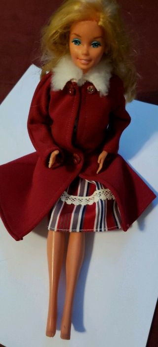 Vintage 1966 Mattel Barbie Doll.  Wearing Red/white/blue Dress & Red Coat.  Earrings