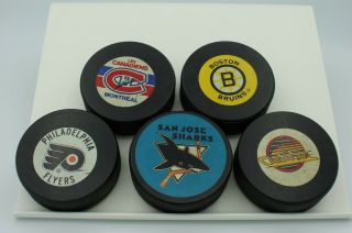 vtg 30 NHL Hockey Pucks Official Game North Stars Whalers Nordiques 75th Shield 3