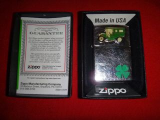 Year 2011 High Polish Zippo Lighter With A Classic Car Logo,  Box And Papers