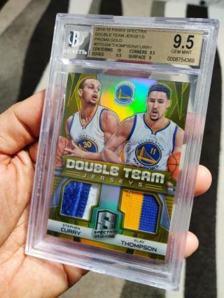 2014 Spectra Gold Stephen Curry Klay Thompson Double Team Jerseys /10