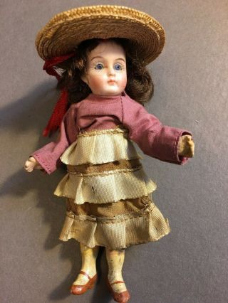 Antique Miniature Bisque Doll 4 1/2 Inches Tall Clothes